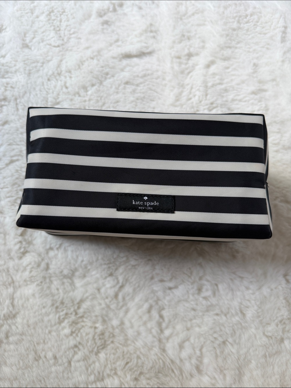 KATE SPADE,  black and white striped makeup pouch